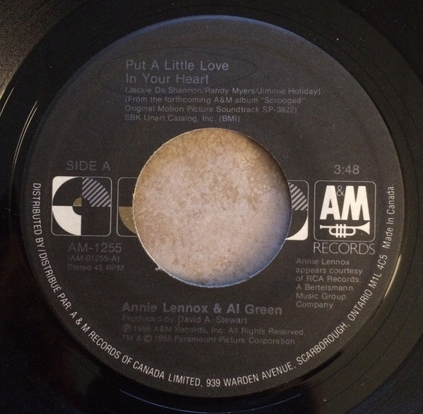 Annie Lennox - Put A Little Love In Your Heart