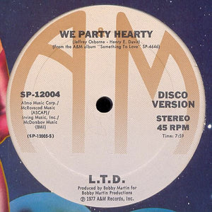 L.T.D. - We Party Hearty / (Every Time I Turn Around) Back In Love Again