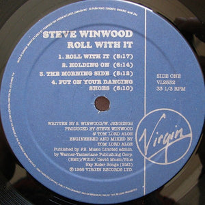 Steve Winwood - Roll With It